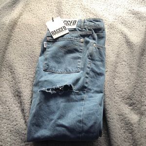 princess polly jeans with cut on back thigh.